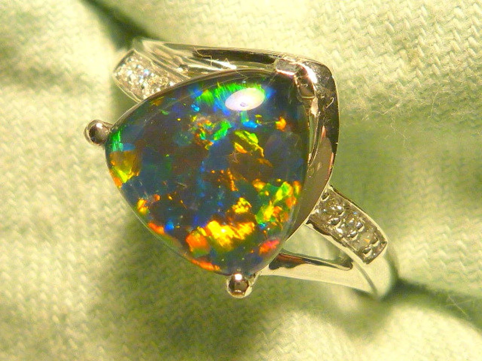 Ladies opal triplet ring with diamonds — handcut by Geoff